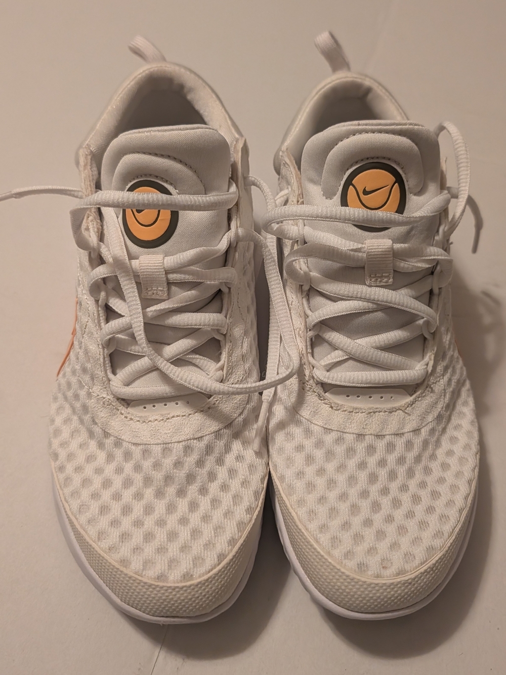 Nike White Mesh Running Sneakers with Orange Accents
